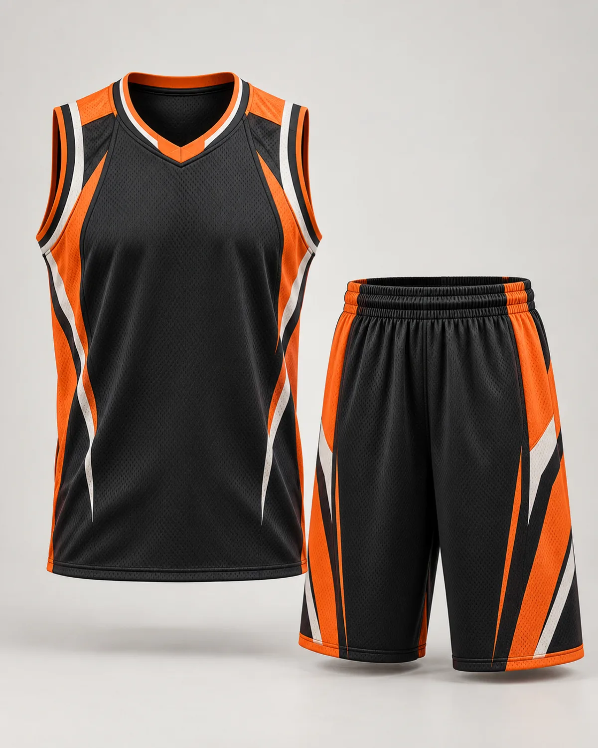 Black and orange basketball uniform design concept on a neutral studio background