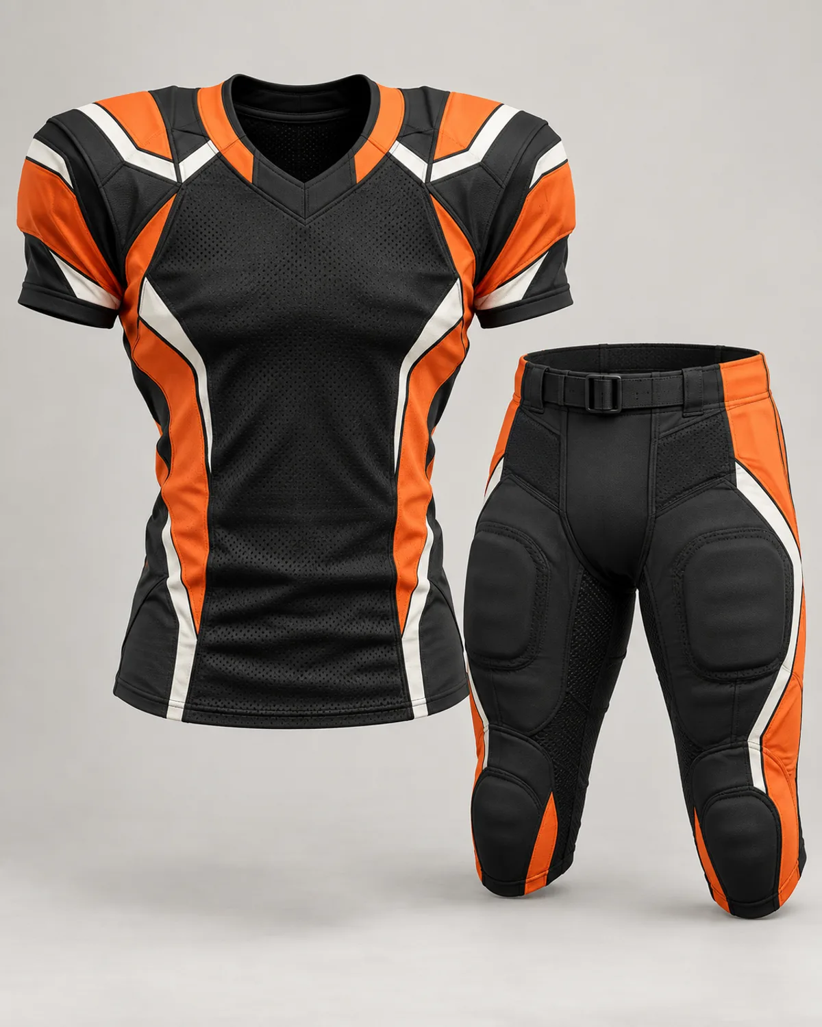 Black and orange football uniform design concept on a neutral studio background